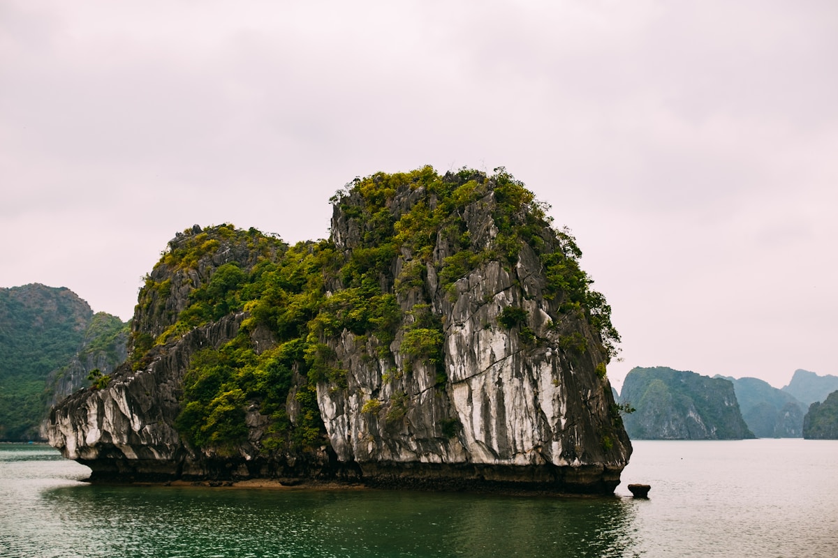 White limestone rock formations between islands, Cat Ba, Vietnam