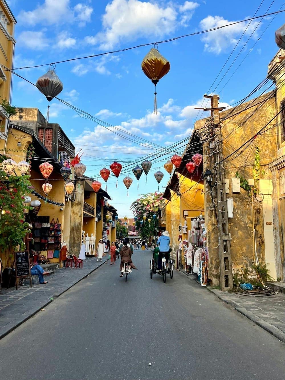 Hoi An Old Town street with colourful silk lanterns overhead