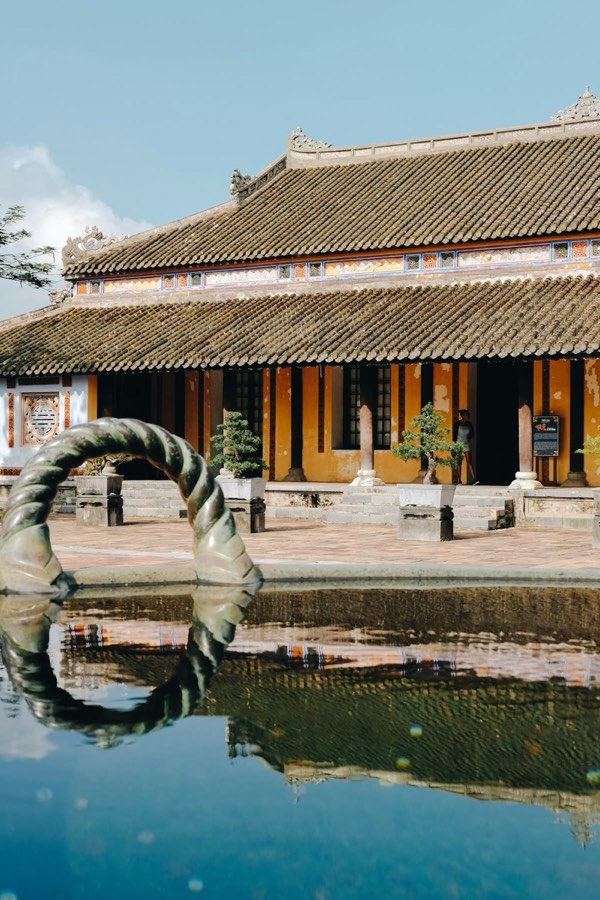 Historic building with garden pond, Hue Imperial City, central Vietnam