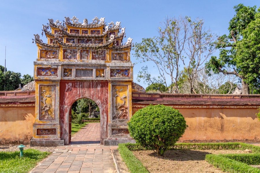 Stone arch gateway in the grounds of Hue Imperial Citadel, Vietnam