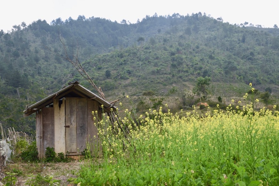Wooden house in green mountain valley, Yen Bai province, Vietnam