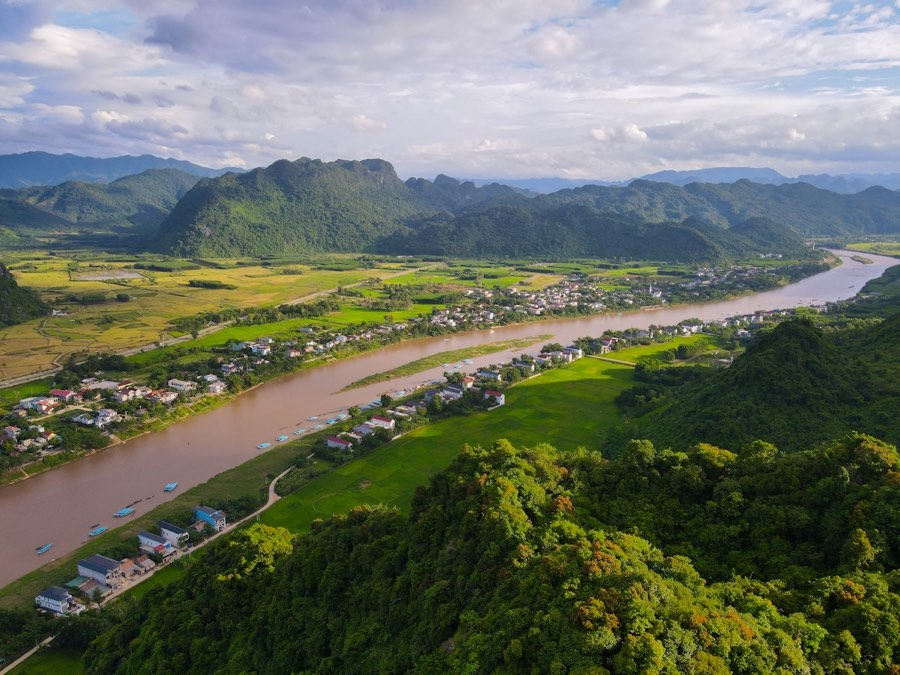 River winding through lush green valley with mountains, northern Vietnam