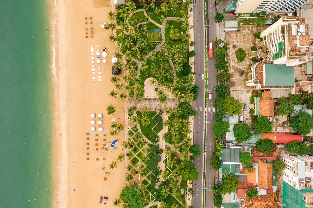 Aerial view of a tropical beach with lush forest, southern Vietnam — Vietnam in May